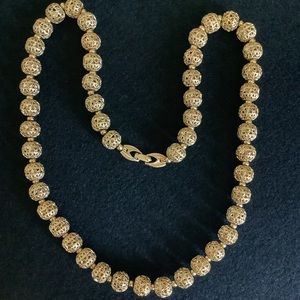 Vintage Monet gold beads necklace.